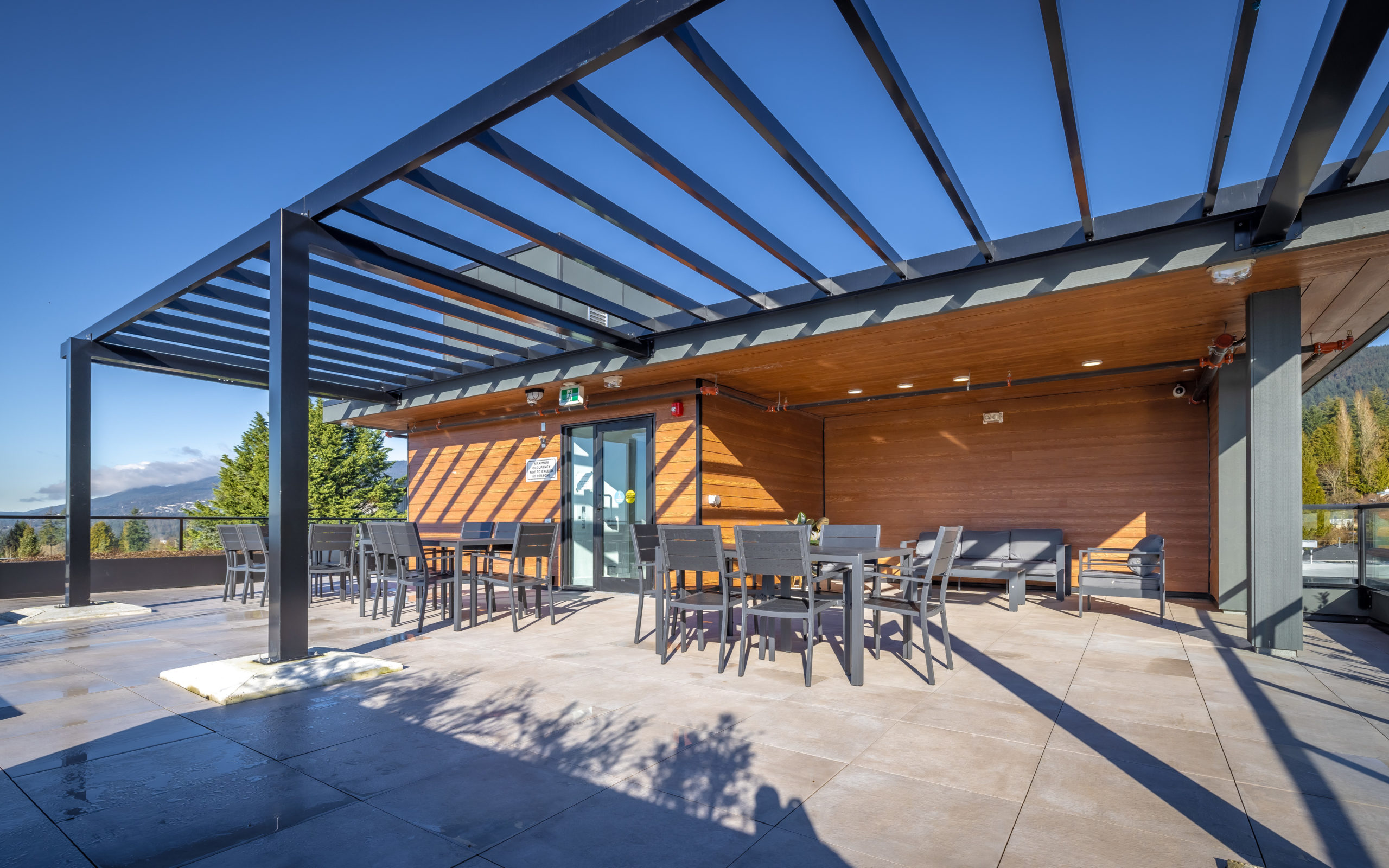 Rooftop lounge seating at AXIR at dusk