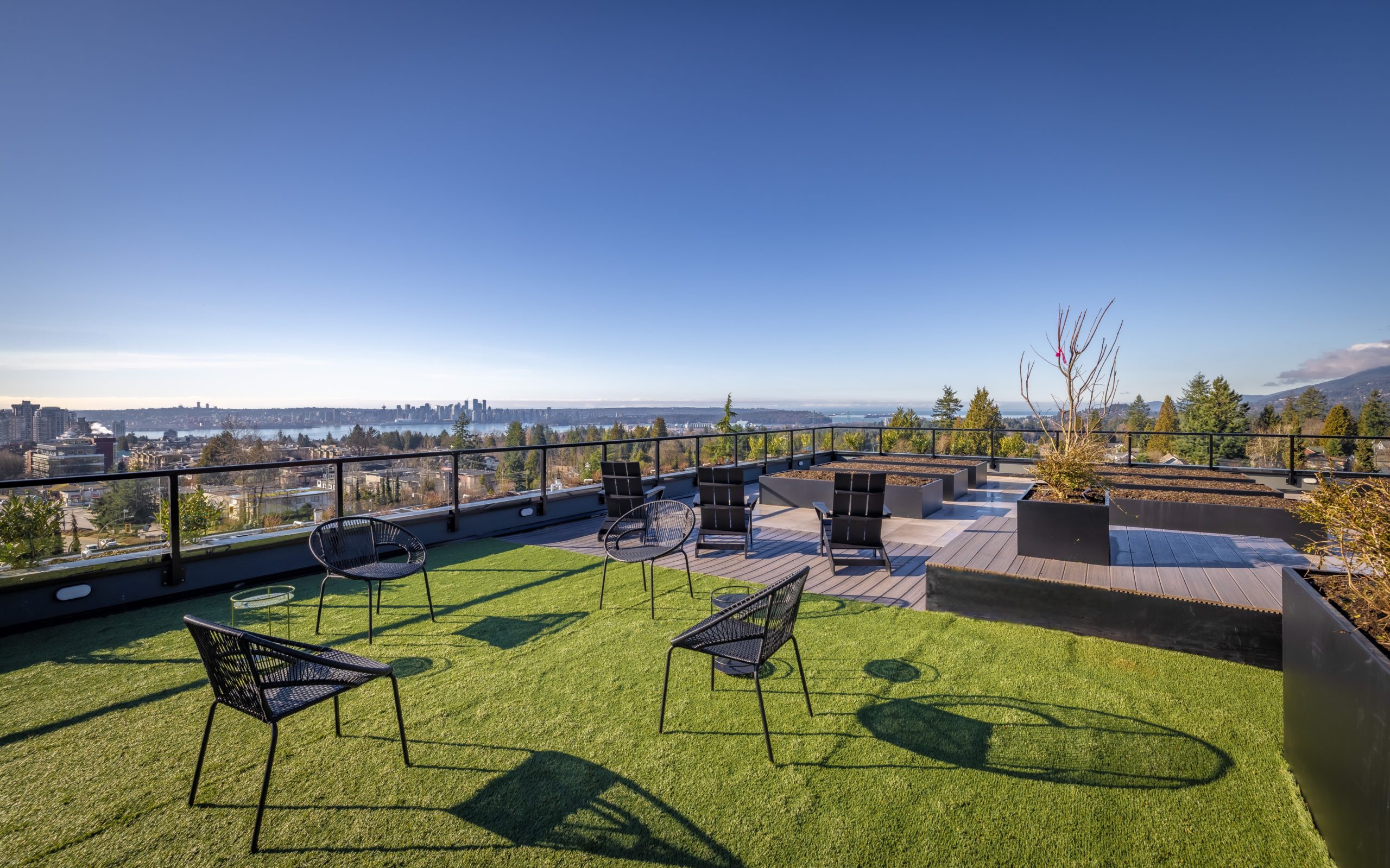 AXIR rooftop terrace with mountain and inlet views